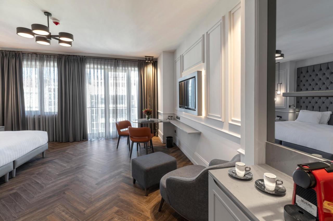 Wish More Hotel Sisli 伊斯坦布尔 外观 照片 A room at the hotel