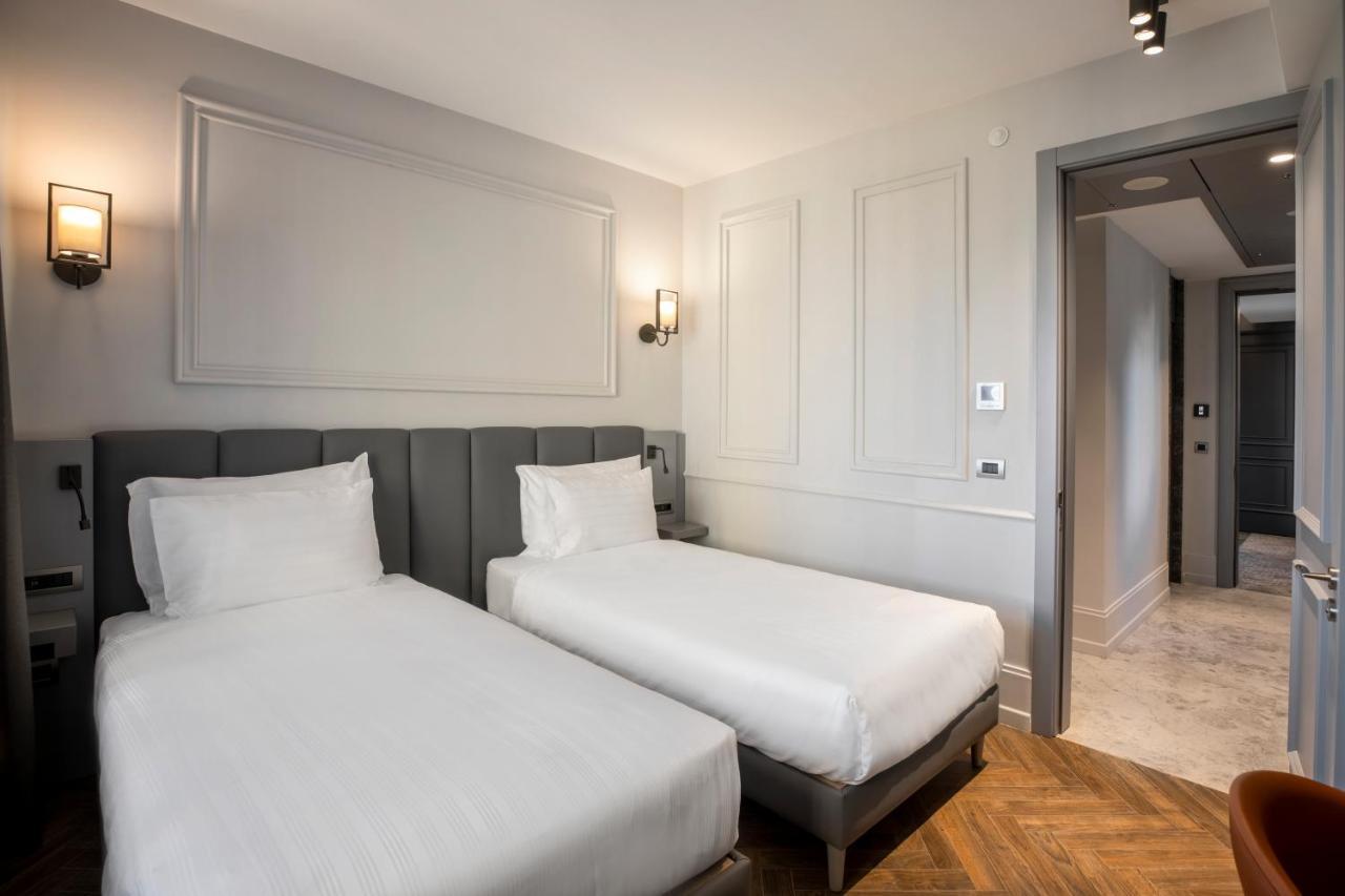 Wish More Hotel Sisli 伊斯坦布尔 外观 照片 A room at the hotel